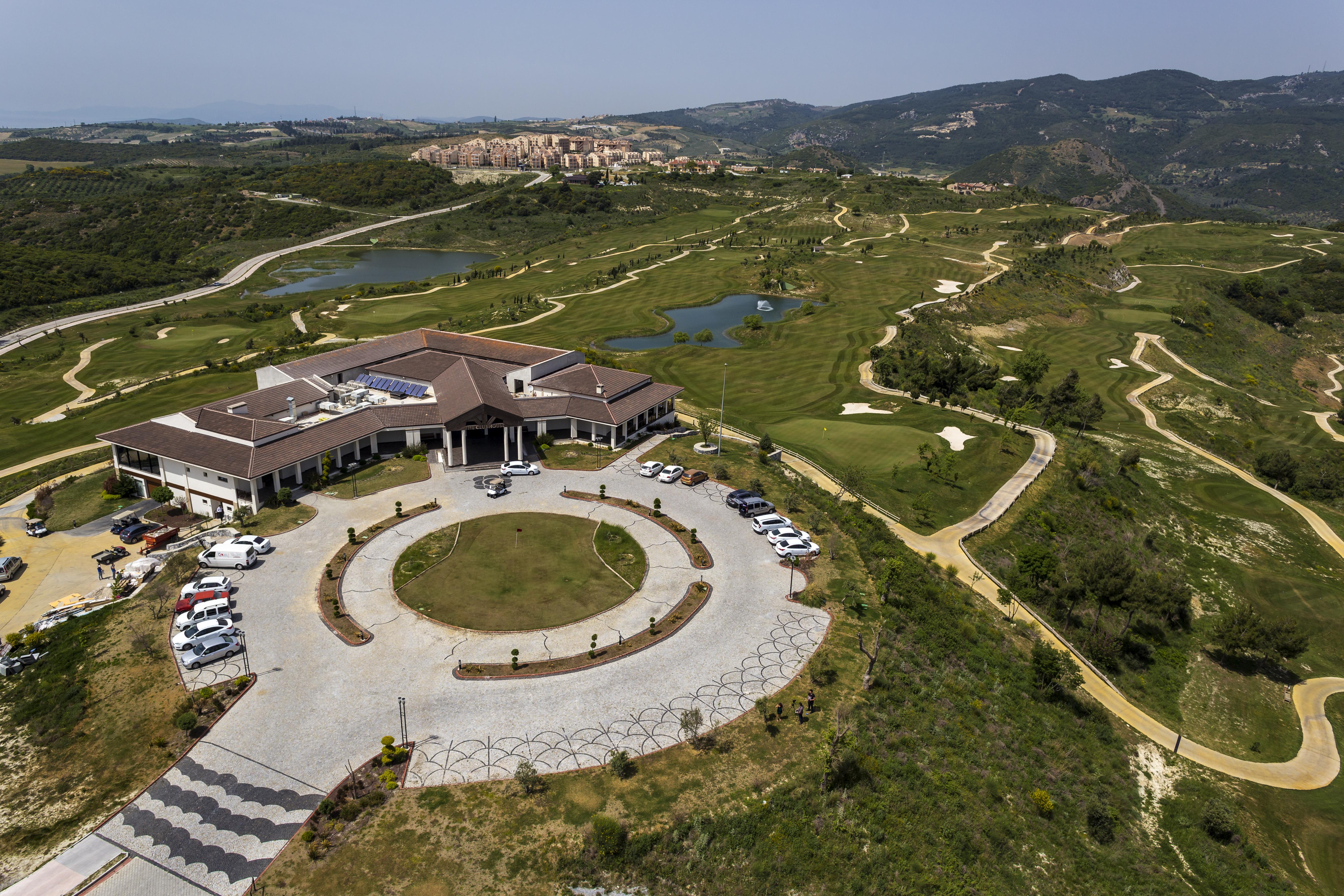 Ramada Resort Kusadasi & Golf Exterior photo Aerial view of the clubhouse