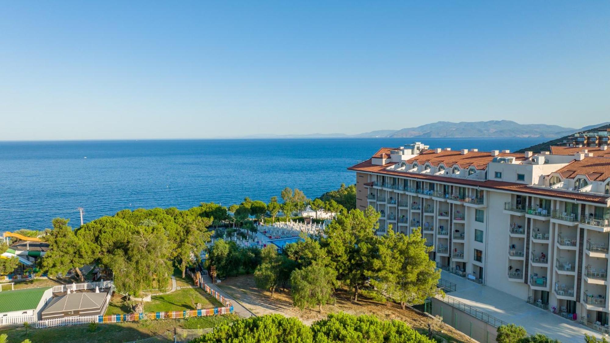 Ramada Resort Kusadasi & Golf Exterior photo A view of the Aegean Sea from the resort