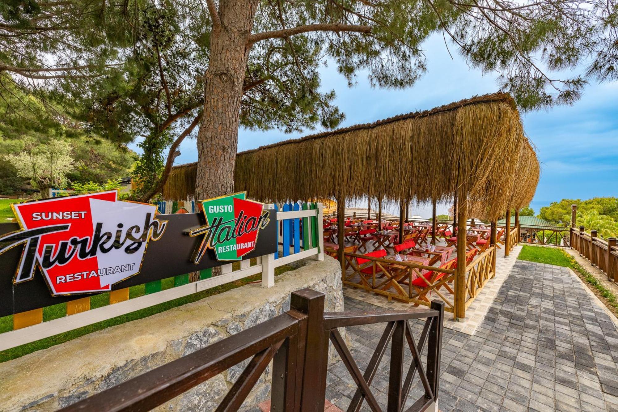 Ramada Resort Kusadasi & Golf Exterior photo Turkish restaurant in Antalya