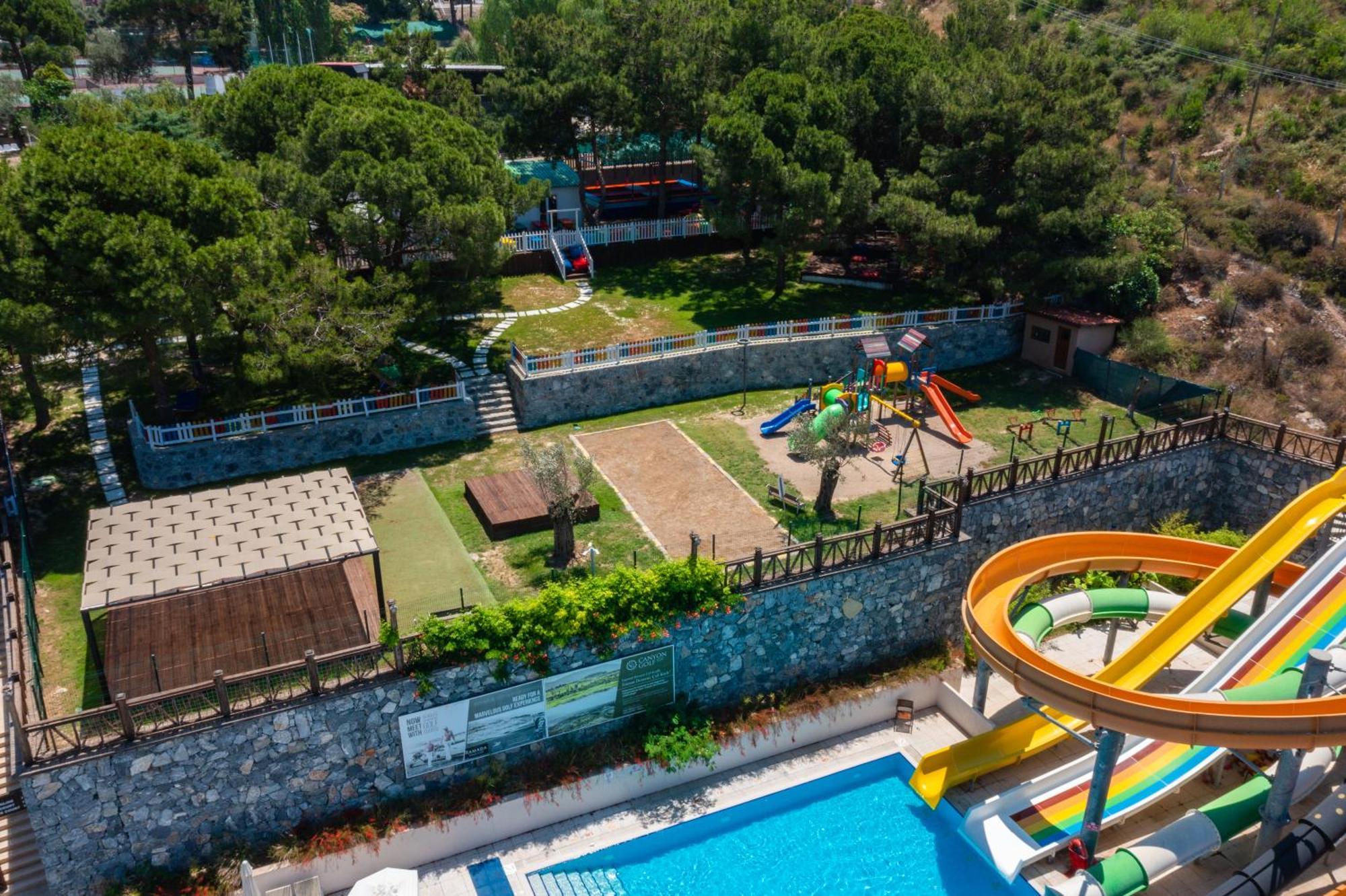 Ramada Resort Kusadasi & Golf Exterior photo Aerial view of the park