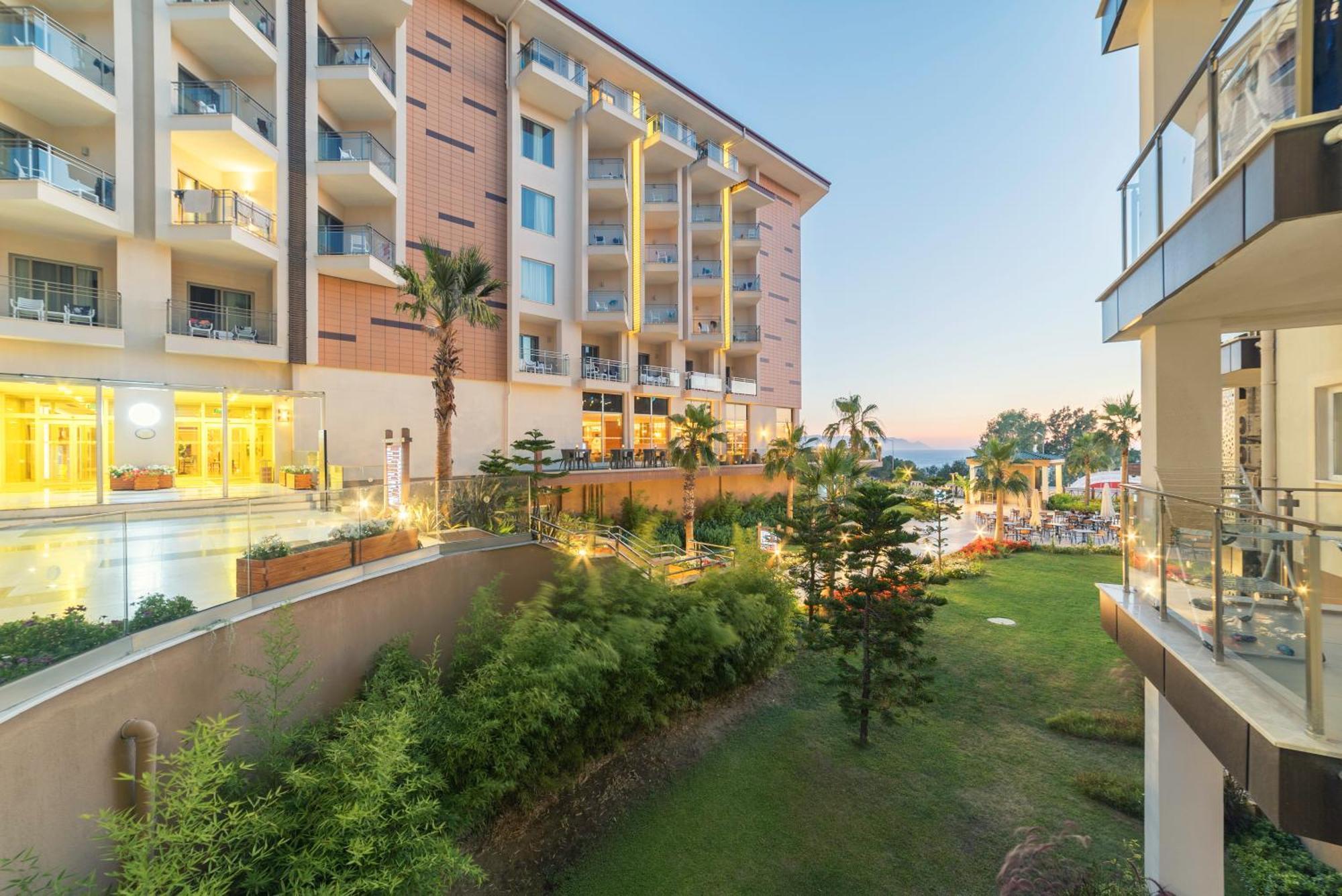 Ramada Resort Kusadasi & Golf Exterior photo The hotel's grounds
